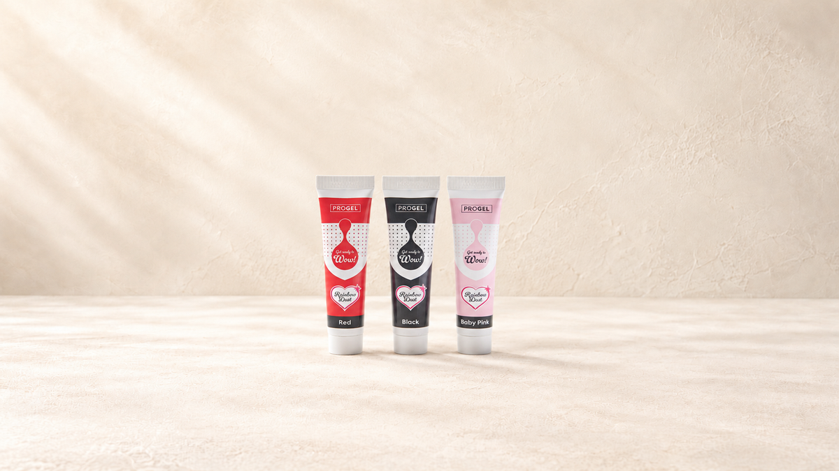 Rainbow Dust — produits de la collection sur fond crème Patissland