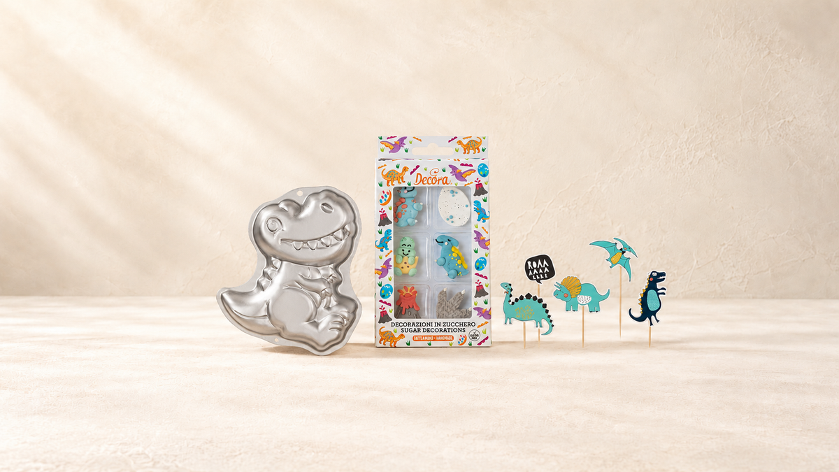 Dinosaures — produits de la collection sur fond crème Patissland