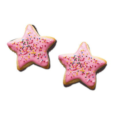 Biscuits en forme d’étoiles glacées rose avec vermicelles multicolores