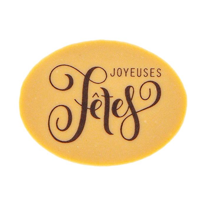 Décor en chocolat Dulcey ovale “Joyeuses Fêtes” – impression naturelle sur chocolat blond Valrhona